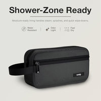 Ginza Toiletry Pouch — on a bathroom counter