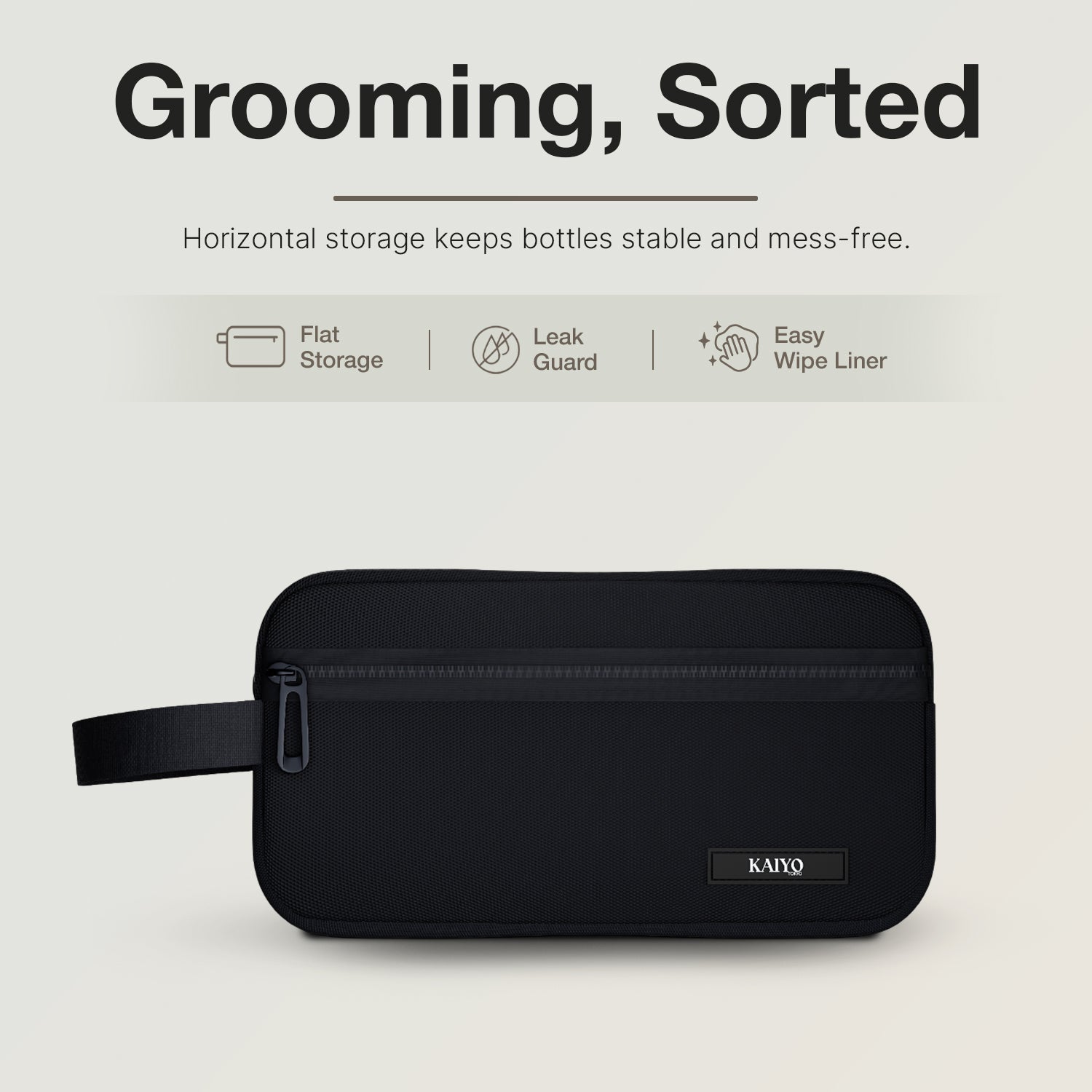 Ginza Toiletry Pouch in Tokyo Noir - horizontal storage keeps bottles stable