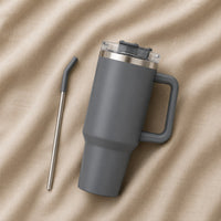 Travel Tumbler 1200ml in Grey resting on natural oatmeal linen
