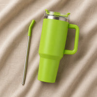 Travel Tumbler 1200ml in Lime Green resting on natural oatmeal linen